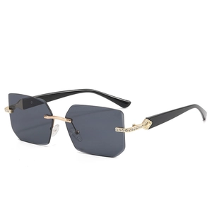 Lunettes de soleil Y2K sans monture, verres gris géométriques et branches en métal doré