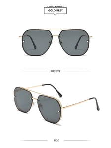 Retro double-bridge sunglasses in gold metal with grey lenses, front and side views