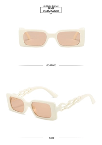 Detail view of beige rectangular sunglasses with stylish hollow wave design temples