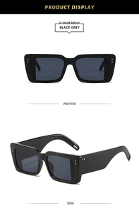 Front and side display of chic black rectangular sunglasses with grey lenses