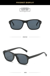 Détails de lunettes de soleil rectangulaires noires avec verres gris et rivets métalliques
