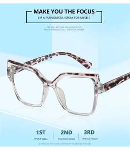 Detail of square candy-colored frames with tortoise pattern and transparent lower rim