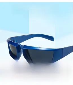 Detail showing dark blue square frame Y2K sunglasses on geometric display stand