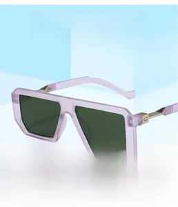 Detail view of square lavender translucent frames with dark green lenses and metal hinges