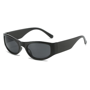 Futuristic Y2K black oval sunglasses with thick frames and retro street style aesthetic