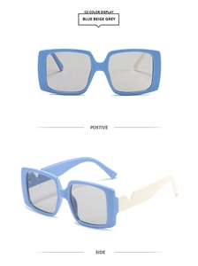 Square fashion sunglasses with two-tone light blue frames and iconic V-shaped temple detail