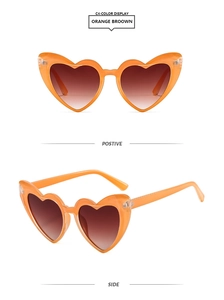 Vues détaillées de lunettes de soleil cœur orange gelée avec verres dégradés bruns