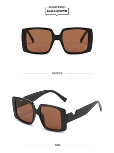Close-up of square black frame sunglasses with brown lenses and V-shaped temple design
