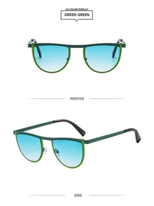 Detail view of green metal sunglasses with blue gradient lenses in cat-eye style