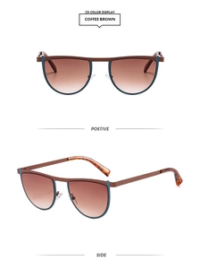 Detail view of coffee brown geometric metal sunglasses with teal trim and gradient lenses