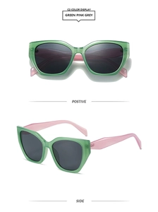 Vues de face et de profil de lunettes de soleil œil-de-chat avec monture vert et rose