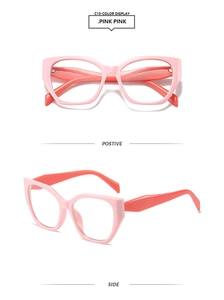 Détails de lunettes œil-de-chat roses avec branches rose orangé vif en gros plan