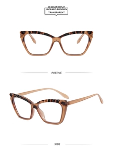 Macro detail of leopard brown transparent cat-eye frame and printed model number