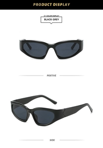 Détail des lunettes de soleil de sport œil-de-chat avec monture noire et verres gris