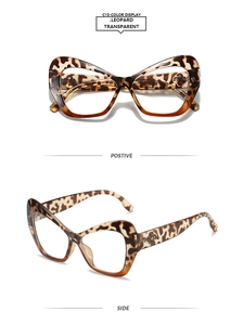 Detailed view of leopard print cat eye glasses with gold flower metal accents on temples
