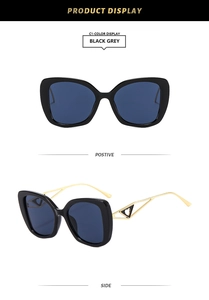 Detailed view of Y2K square sunglasses with black frames and gold metal temples