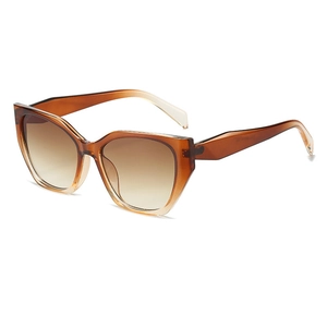 Lunettes de soleil œil de chat géométriques avec verres dégradés marron et monture ambre