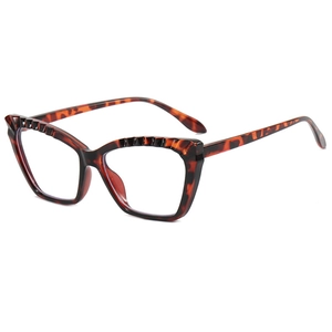 Cat eye glasses frame with dark tortoiseshell texture and geometric 3D faceted design