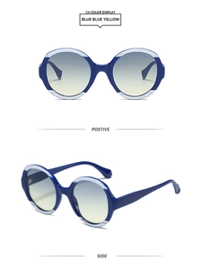 Vue de face et de profil de lunettes de soleil rondes avec monture bleue et verres dégradés