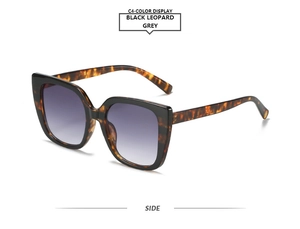 Side view of square sunglasses featuring black leopard frames and purple gradient lenses