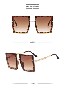 Detail view of leopard print square sunglasses with brown gradient lenses and gold temples
