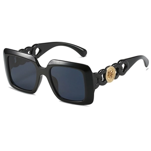 Lunettes de soleil carrées noires avec monture épaisse et branches à maillons roses dorés