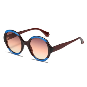 Lunettes de soleil rondes oversize avec bordure bleue contrastée et verres dégradés