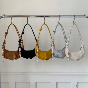 Minimalist half-moon dumpling bags in five colors with stylish colorful bead charms