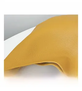 Detailed close-up of yellow litchi pattern leather showing the premium grainy texture