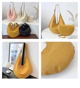 Detailed view of hobo bucket bags in pink, beige and yellow with pebble grain texture