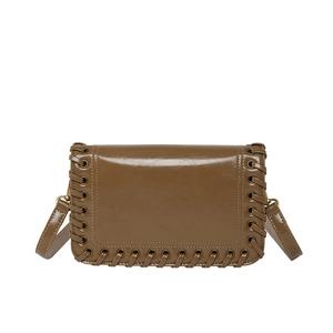 Brown glossy leather crossbody square bag with woven edge details and matching shoulder strap
