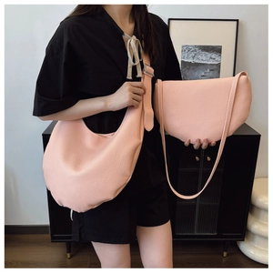 Pink lychee texture bucket bag and half moon pouch set with wide leather strap