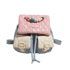 Mini macaron quilted backpack in blue and pink with a colorful pearl handle