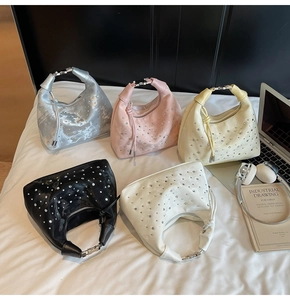 Detailed arrangement of sparkling rhinestone hobo bags in silver pink and black
