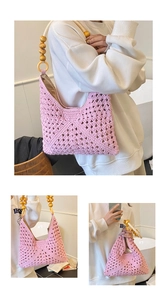 Detail of pink hand-woven crochet tote bag featuring natural wooden bead handles