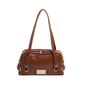 Brown Boston bag in glossy patent leather finish with silver hardware and dual straps