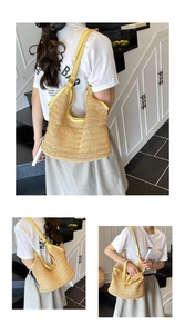 Detail of hand-woven straw tote bag with yellow leather trim and large interior space