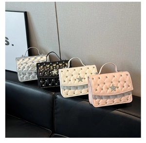 Detailed collection of mini quilted handbags with sparkling rhinestones in four elegant colors
