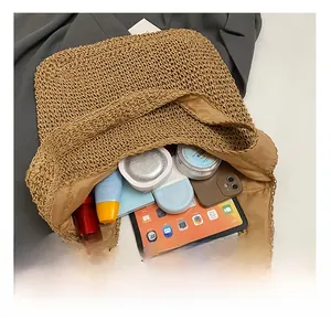 Top view of spacious straw tote bag interior showing large capacity for essentials