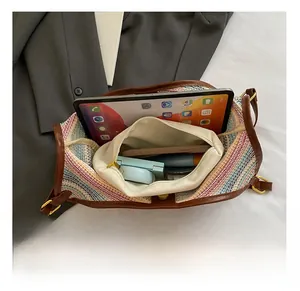 Detailed top view of a striped woven tote bag showing its spacious inner capacity