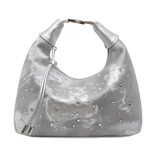 Silver metallic pleated hobo bag with rhinestone studs and top handle on white background