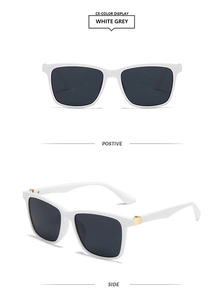 Detail view of white square sunglasses with gold metal hinges and grey lenses