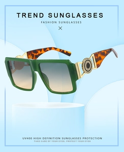 Detail of square oversized sunglasses with UV400 gradient lenses and gold tortoiseshell arms