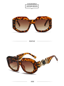 Detail view of leopard brown geometric sunglasses with gradient lenses and gold metal accents