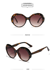 Vues de face et de profil de lunettes de soleil rondes léopard avec verres dégradés
