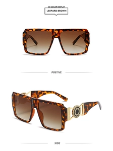 Detail of square leopard frame sunglasses with golden round metal temple ornament