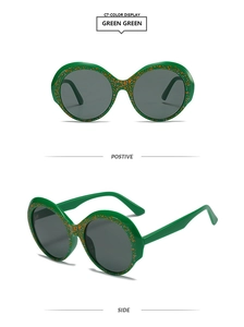 Détails de lunettes de soleil rondes à fleurs avec monture verte et taches oranges