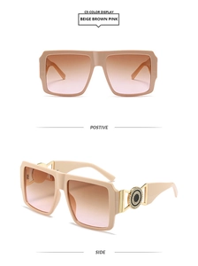 Detail view of square beige frames with golden metal hinges and pink gradient lenses