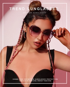 Detail of square oversized sunglasses with purple gradient lenses and rhinestone rim