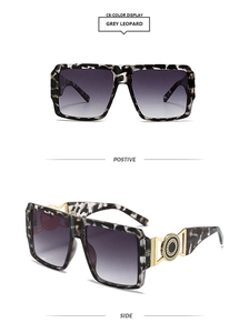 Detail of grey leopard square sunglasses featuring golden sunburst metal hinge decor